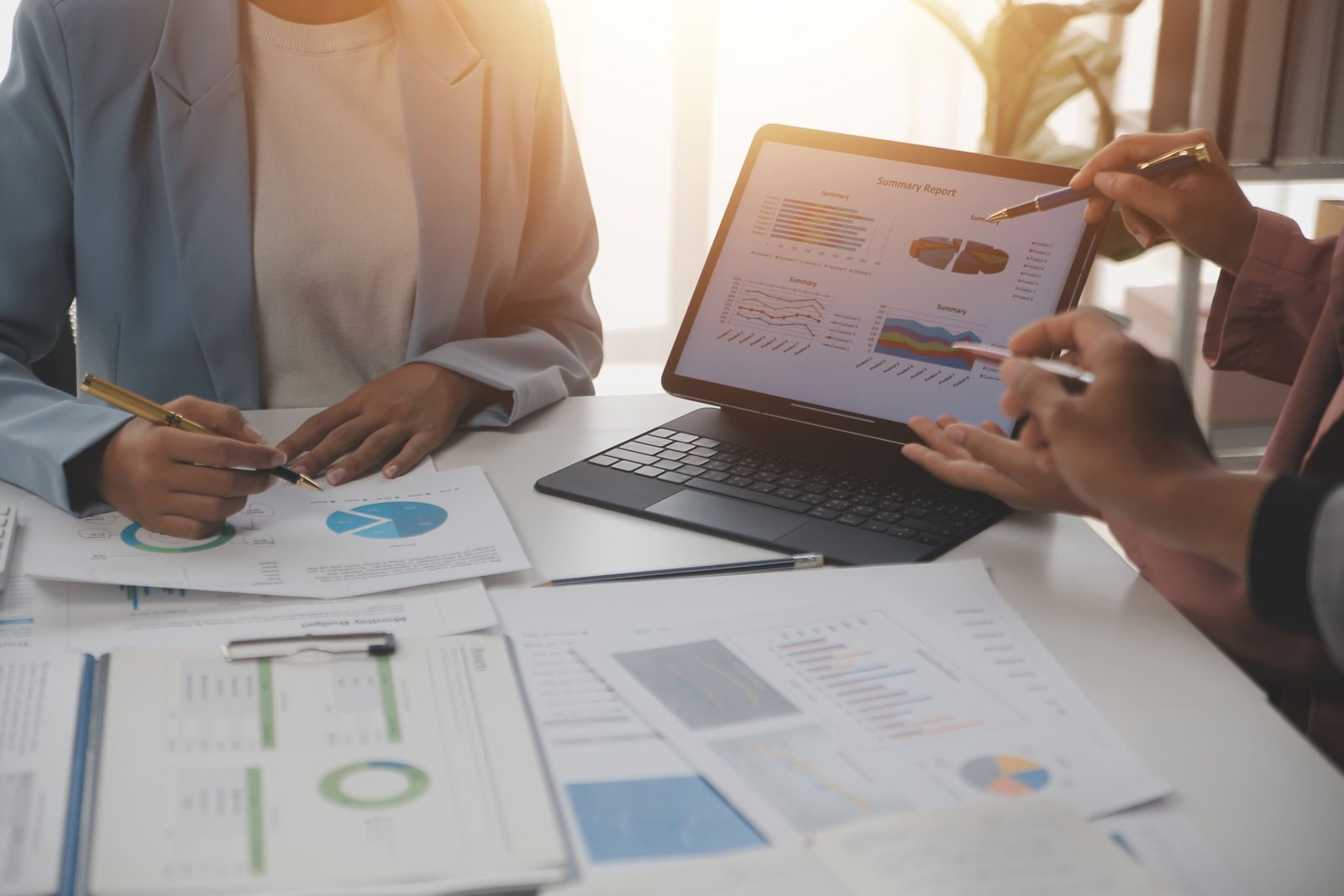 vecteezy-close-up-of-business-team-analyzing-income-charts-and-graphs-50266725